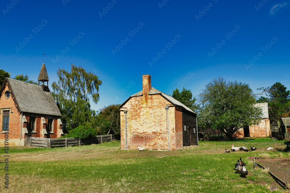 Tiny church, farm buildings and ducks in the historic farm and convict village Brickendon (1824), Longford, Tasmania, Australia, a world heritage site.
Tiny church, farm buildings and ducks in the historic farm and convict village Brickendon (1824), Longford, Tasmania, Australia, a world heritage site.