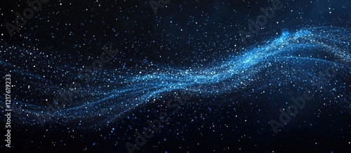 Blue luminous wave of particles on a dark background with copy space for text or graphics.
