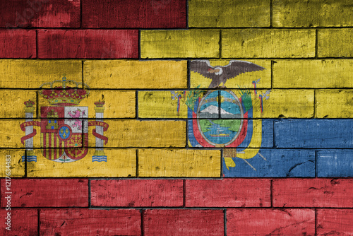 colourful painted big flag of spain and flag of ecuador on a massive old brick wall background. concept