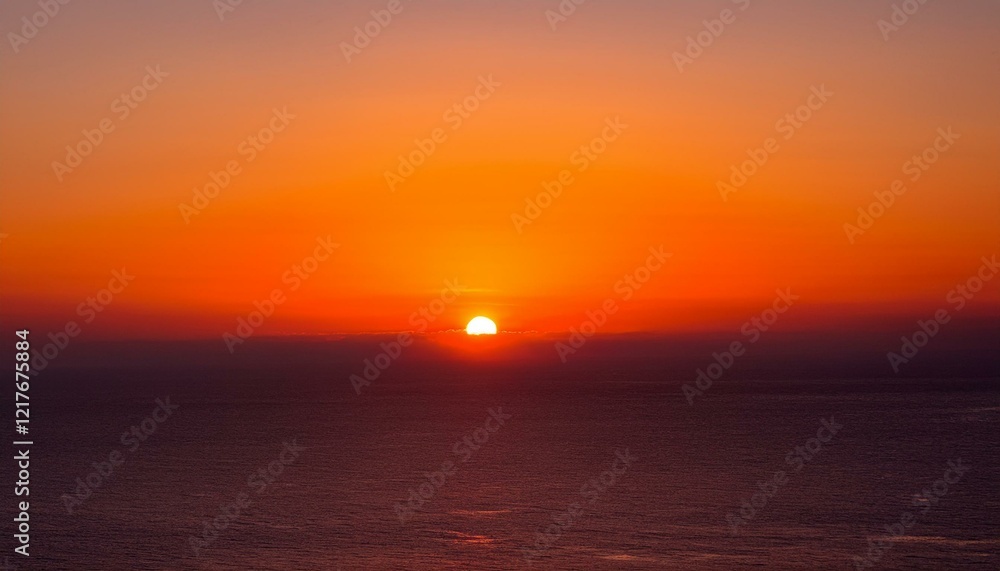 Fototapeta premium 멀리 수평선 위로 떠오르는 선명한 일출, 붉고 따뜻한 색감의 태양