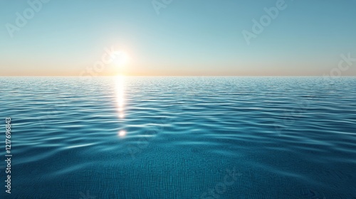 Calm ocean water reflecting sunlight during early morning hours at the horizon