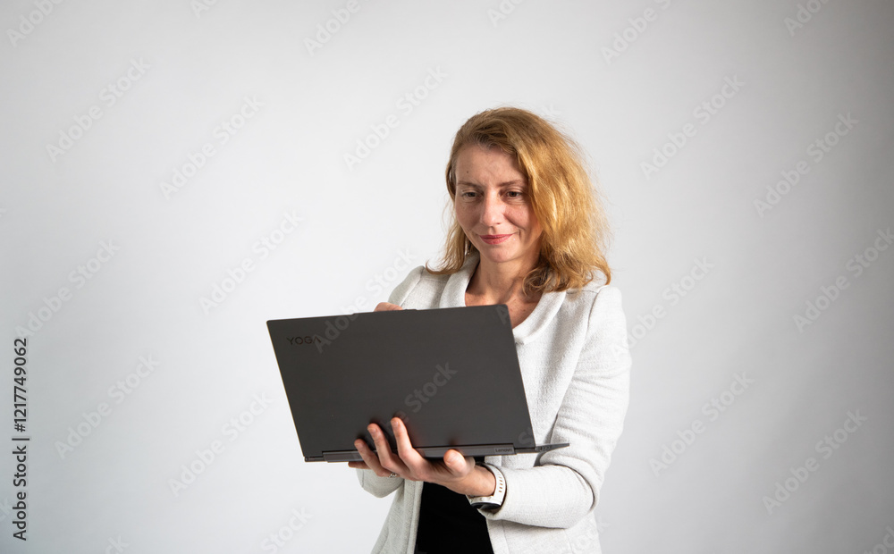 casual businesswoman working on a laptop casual businesswoman working on a laptop