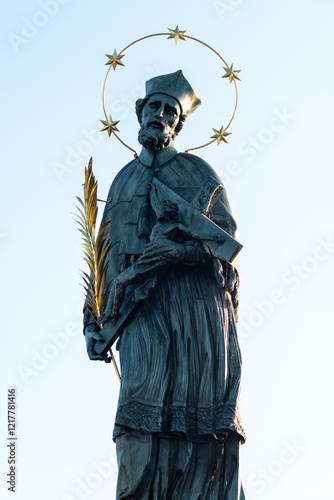 Photos Statue of John of Nepomuk mounted to the balustrade of Charles Bridge in Prague,