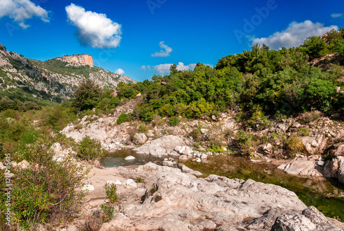 Sardegna, paesaggio con fiume e montagne nell'area del famoso canyon di  Gorroppu, Italia, Europa occidentale  photo