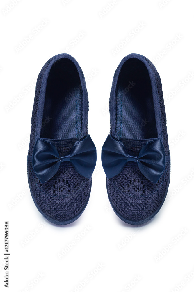 Navy blue girls' ballerinas with bow on white background Navy blue girls' ballerinas with bow on white background