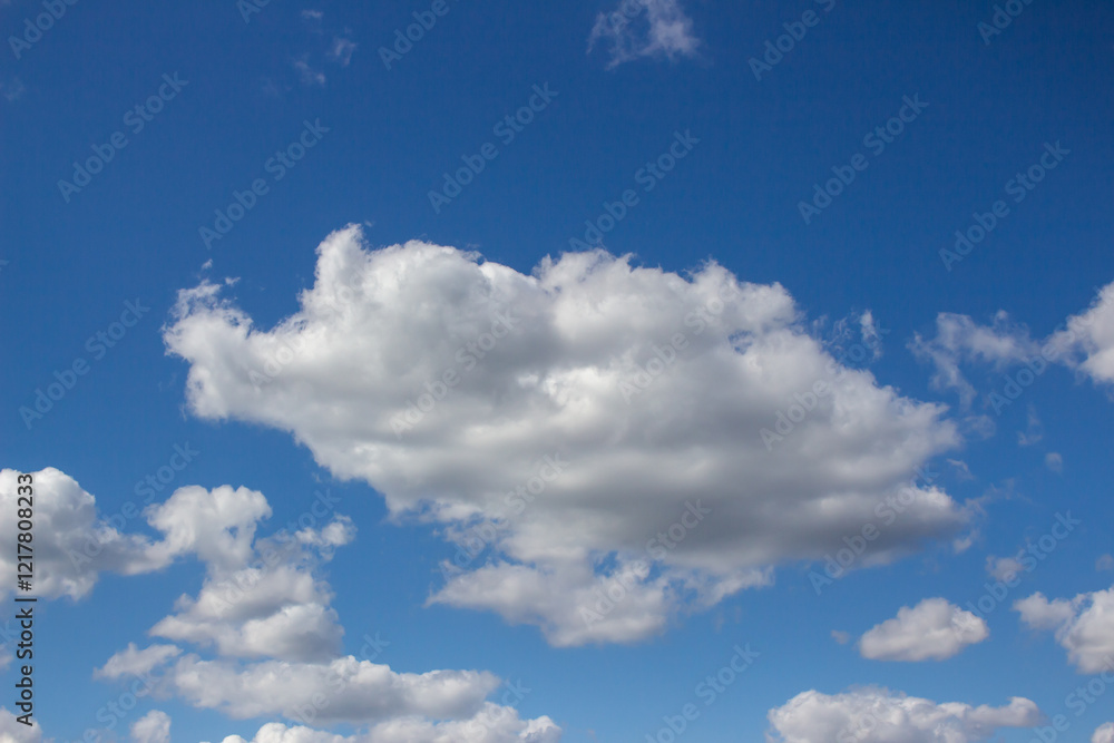 Blue sky with white clouds. The background is a clear blue sky without any cumulus clouds. Blue sky with white clouds. The background is a clear blue sky without any cumulus clouds.