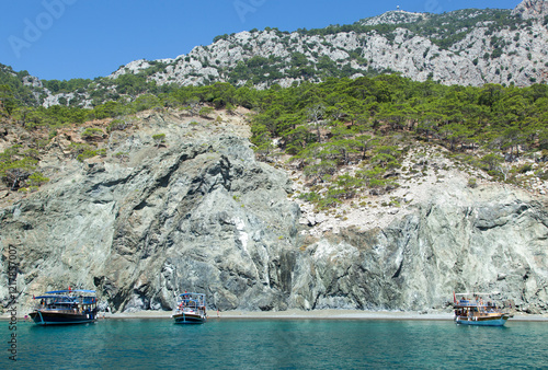 Suluada Island Beach With Tourist Boats photo