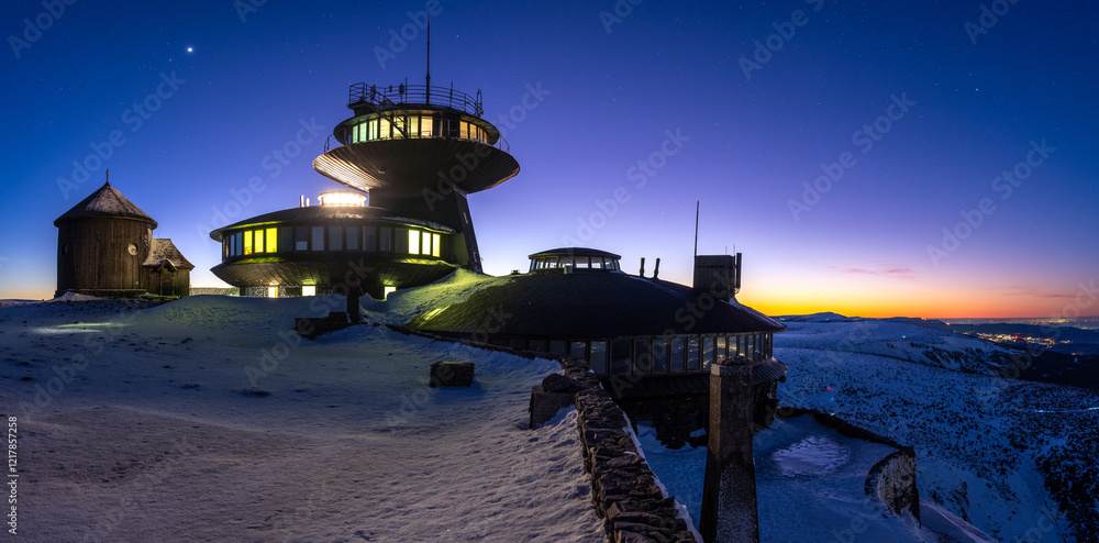 architecture of meteorological station observatory on Snezka summit during sunset in Krkonose mountains in Poland