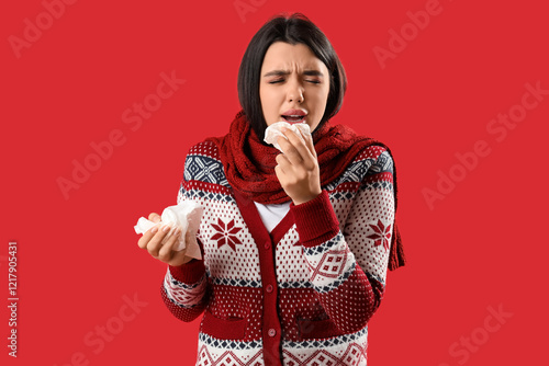 Sick young woman with runny...