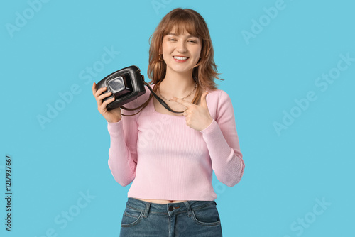 Beautiful young woman point...