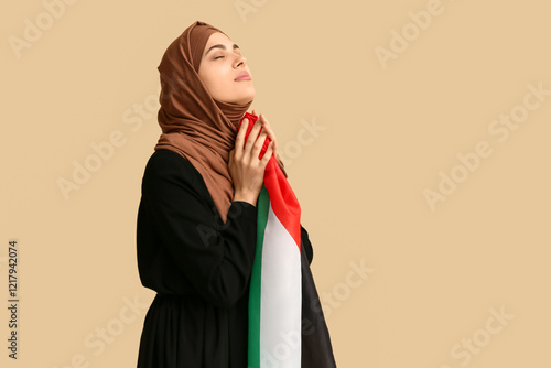 Young Muslim woman with Pal...