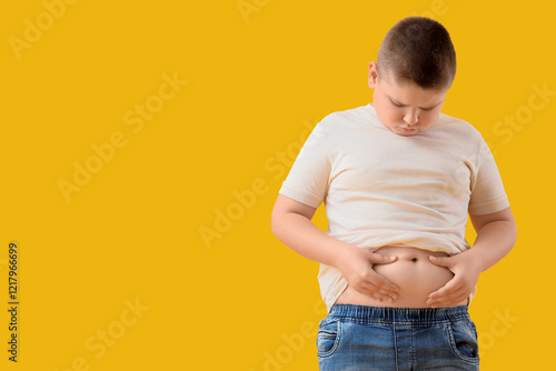 Overweight boy with big bel...