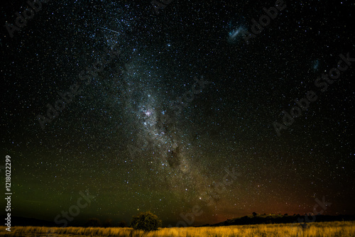 Obraz na plátně In the dark of the night the Milky Way Galaxy lights up the sky