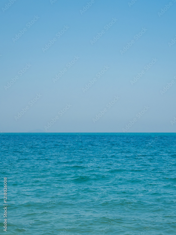 Obraz premium Landscape beautiful summer vertical horizon look view point shore open sea beach cloud clean and blue sky background calm nature ocean wave water nobody travel at thailand chonburi sun day time