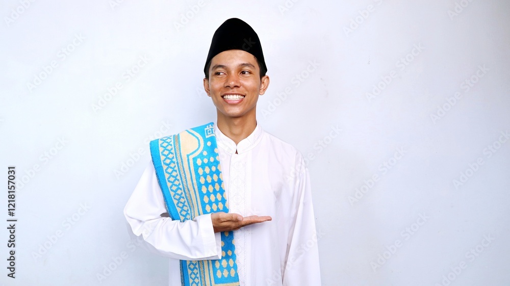 handsome asian muslim young man excited pose showing open palms and looking sideways for promotion, product and discount. recommend something with isolated white background handsome asian muslim young man excited pose showing open palms and looking sideways for promotion, product and discount. recommend something with isolated white background
