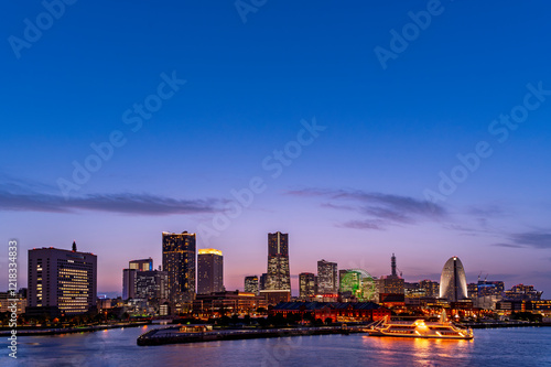 Obraz na płótnie sweet sunset winter and light illumination from Cityscape of Yokohama city, Skyline and office building and downtown in Minatomirai Area, Yokohama city port, Kanagawa, Japan w salonie