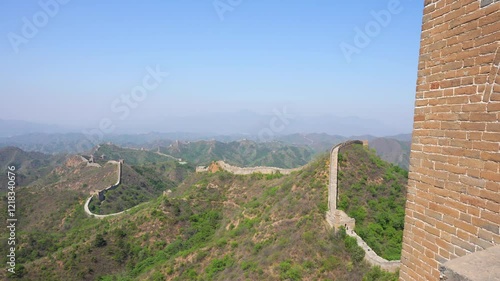 Endless Great Wall of China in the Jinshanling section. Panning left shot photo