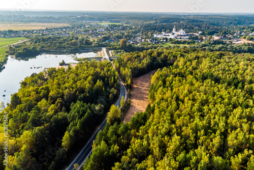 Aerial view of the road leading to a rural development. Borovsk outskirts, Kaluga region, Russia photo