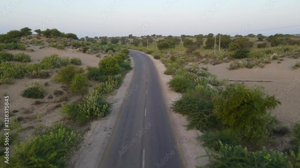 The Drone Shot of Rural Road in Thar Desert Situated in Southern Province of Pakistan Sindh.