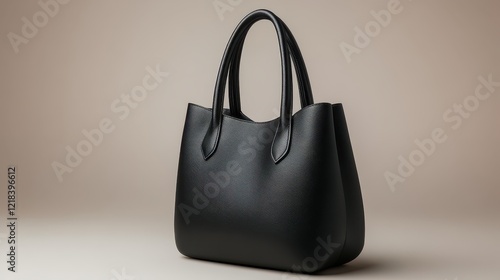 Hand bag mockup showcasing a sleek black design with no logo, presented in a minimalist style on a neutral background for a refined display, ideal for fashion or retail purposes photo