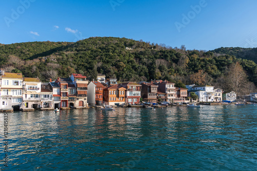 View of waterfront houses small fishing town in Asian side of the city. Anadolu Kavağı, Istanbul, Turkey.