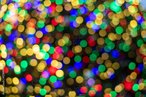 Bokeh out of focus abstract colored circles Christmas tree lights photo