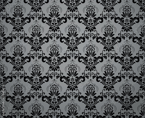 Wallpaper in the style of Baroque. Seamless vector background. Gray and black floral ornament. Graphic pattern for fabric, wallpaper, packaging. Ornate Damask flower ornament