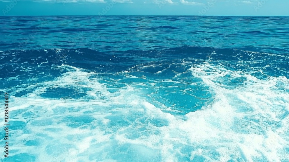 Pure blue turquoise water texture of the ocean sea with foam from and waves Pure blue turquoise water texture of the ocean sea with foam from and waves