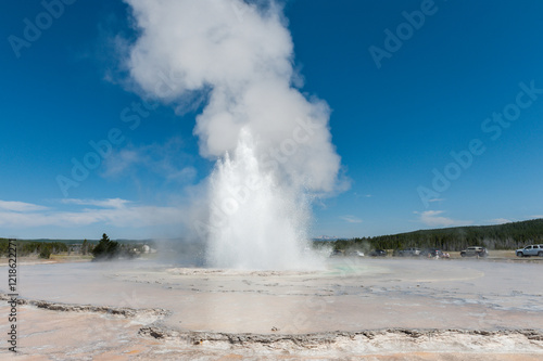 Eruption of the Great Fountain Geyser in Yellowstone National park. photo