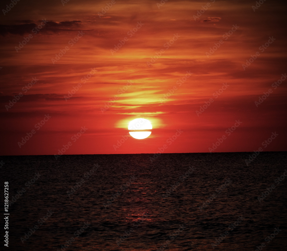 Sea sunset landscape on the beach water Red orange sky sun Sea sunset landscape on the beach water Red orange sky sun