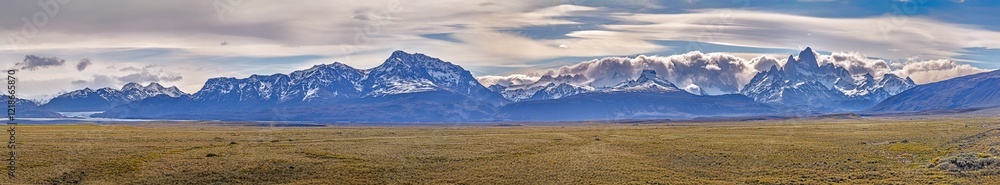 Expansive view of mountains near El Chalten with dramatic skies and open Patagonian landscape Expansive view of mountains near El Chalten with dramatic skies and open Patagonian landscape