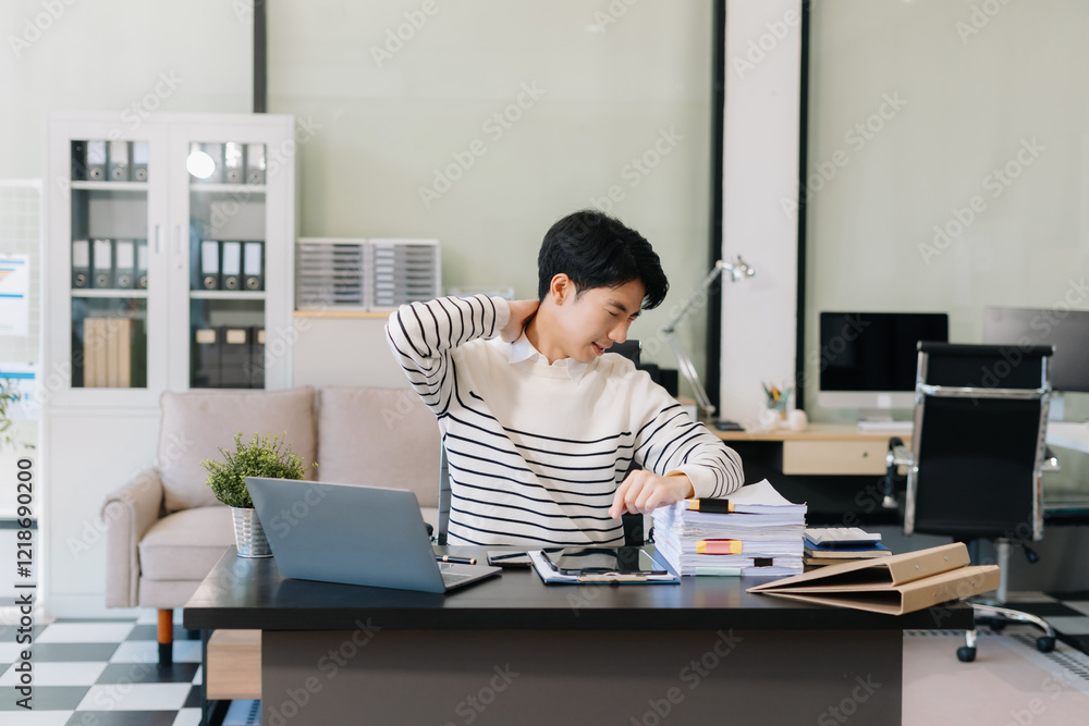 Businessman is doing a stretchy posture due to sitting in the office for too long, office syndrome concept. Businessman is doing a stretchy posture due to sitting in the office for too long, office syndrome concept.