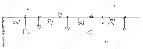 A small lonely bird sits on a garland of hearts. A cute garland of flags and hearts hanging on a thread