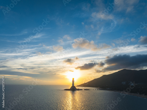 Guanyin statue at seaside in nanshan temple, hainan island , China. Words mean mercy and blessing. photo