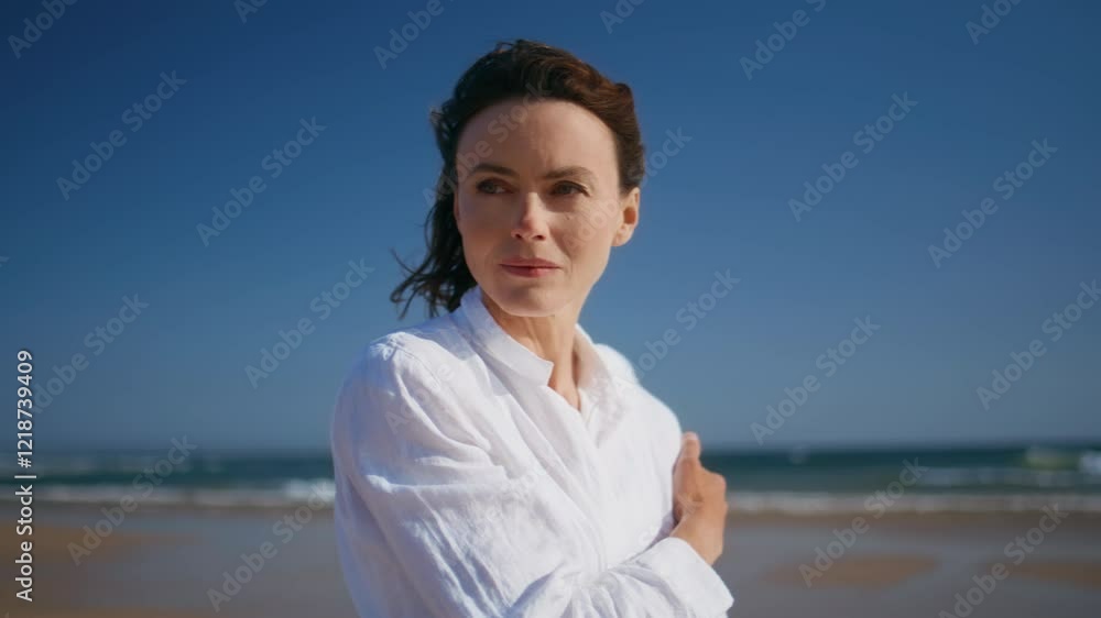 Contemplative woman standing beach enjoying breeze closeup. Thoughtful lady Contemplative woman standing beach enjoying breeze closeup. Thoughtful lady