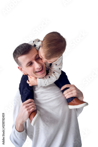  father carries his son in his arms and plays with him in a minimalist studio
