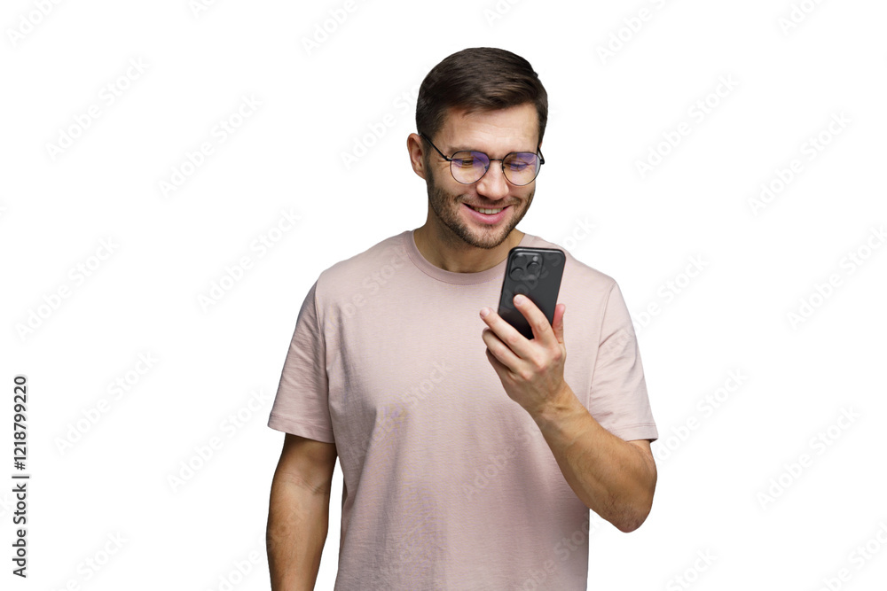 Young man enjoying a moment of happiness while using a smartphone indoors Young man enjoying a moment of happiness while using a smartphone indoors