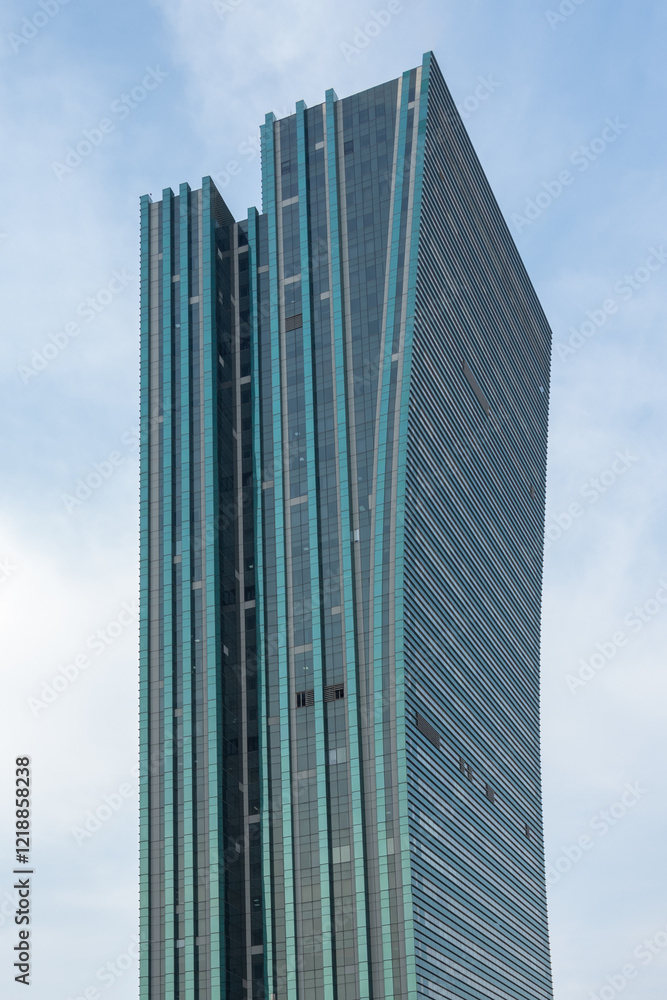 Modern skyscraper against a bright sky. Astana, Kazakhstan. 2023 Modern skyscraper against a bright sky. Astana, Kazakhstan. 2023