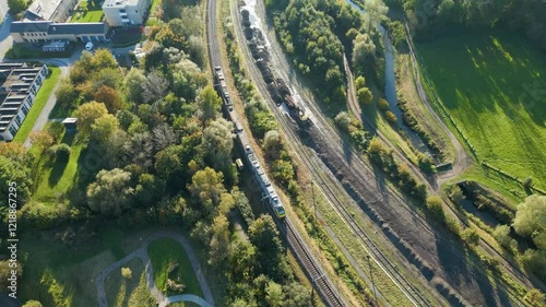 tracks train moves along railway track insight into public transport system belgium connectivity efficiency aerial drone view footage belgian network passenger 