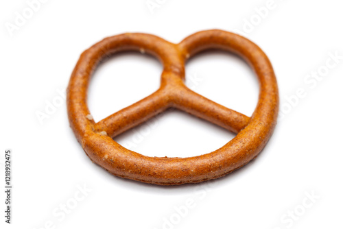 Salted pretzel on white background. German traditional pastry. photo