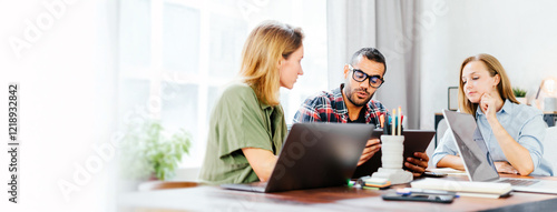 Group of young people working together. Creative business people in modern office