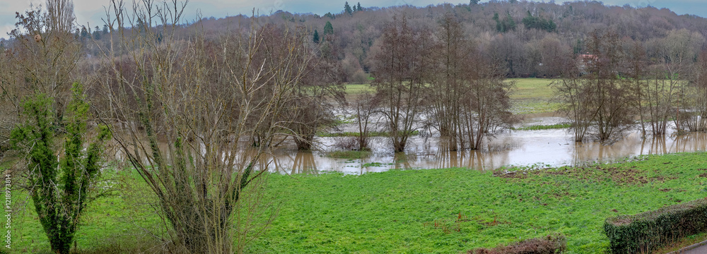 Obraz premium Normandy, France, Europe : Exterior photo view water floods due to climate change in fields creating damage disaster in agriculture environement