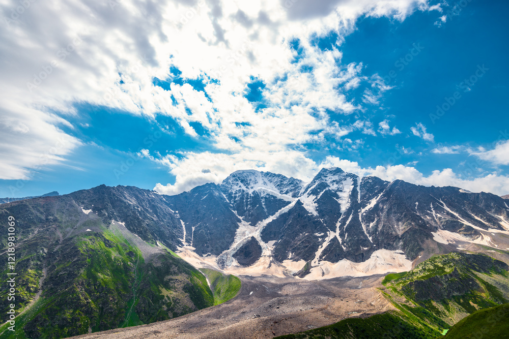 Beautiful dramatic view of the rocky glacier Semerka. North Caucasus Beautiful dramatic view of the rocky glacier Semerka. North Caucasus