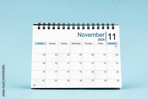 Wallpaper Mural November 2025 Monthly desk calendar for 2025 year on soft blue background. Torontodigital.ca