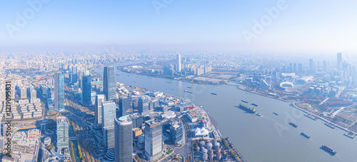 Aerial view of XuHui business district skyscraper and winding river in Shanghai photo