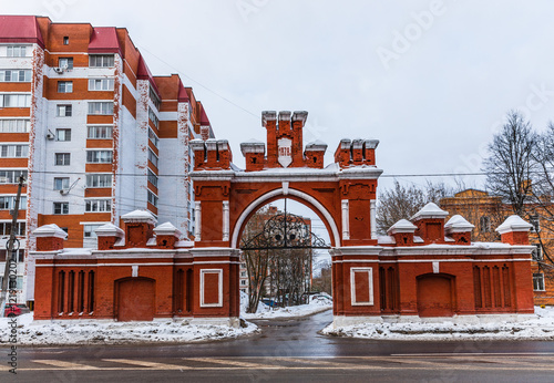 Krasnoarmeisk, Russia - February 05, 2023: Red (Moscow) Gate, the brick gate is one of the old entrances to the territory of the Voznesensk paper-spinning factory. photo