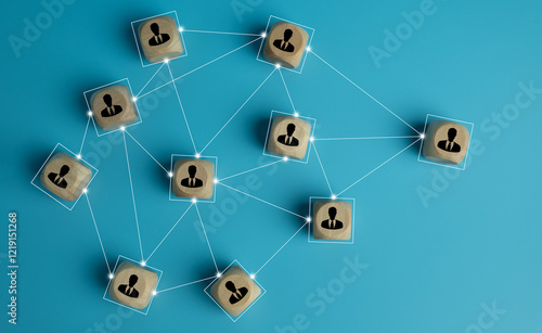 Fotografía Wooden cube block with people icons and link connection network on pastel blue background, Coordination teamwork, Building strong organization