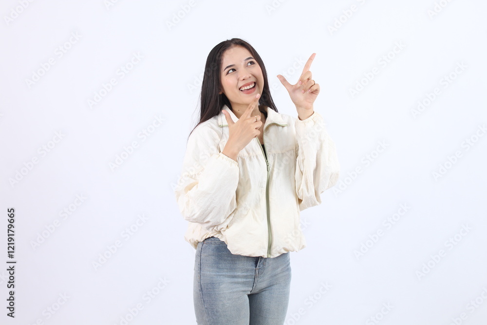 Beautiful woman smiling and pointing to aside empty space. isolated on white Beautiful woman smiling and pointing to aside empty space. isolated on white