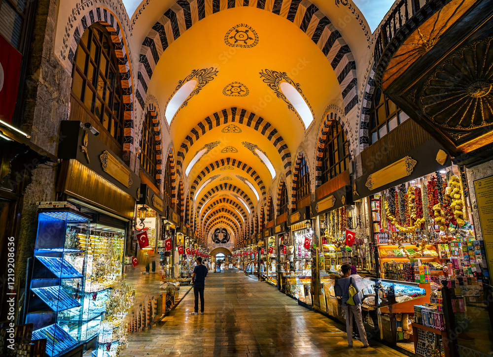 Fototapeta premium Vibrant Traditional spice Market With Decorative Arched Ceiling and Brightly Lit Colorful Stalls, Istanbul, Turkey