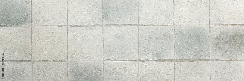 Fototapeta premium Gray tiles create a sleek and glossy background, adding depth and sophistication to any interior or design project, banner